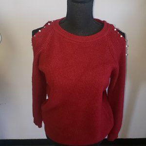 Red sweater with pearl detail